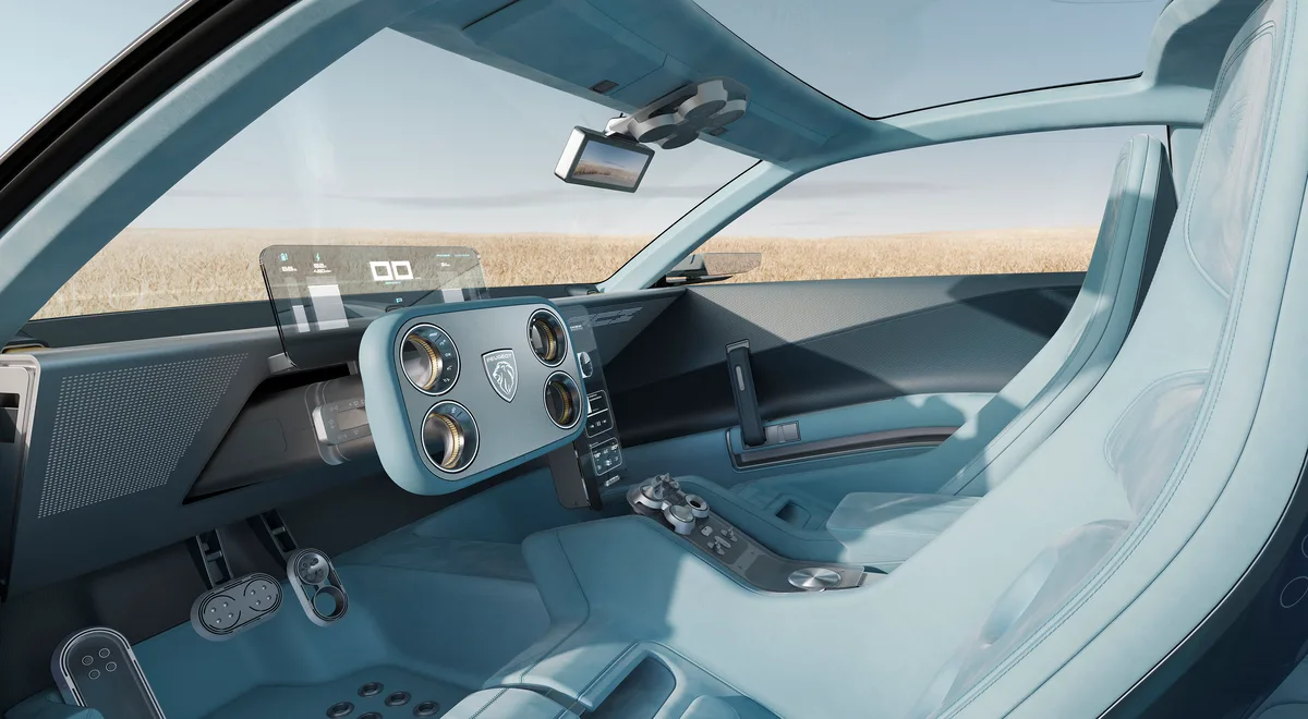 Interior del Peugeot RCZ Vision con asientos azul claro y pantalla transparente